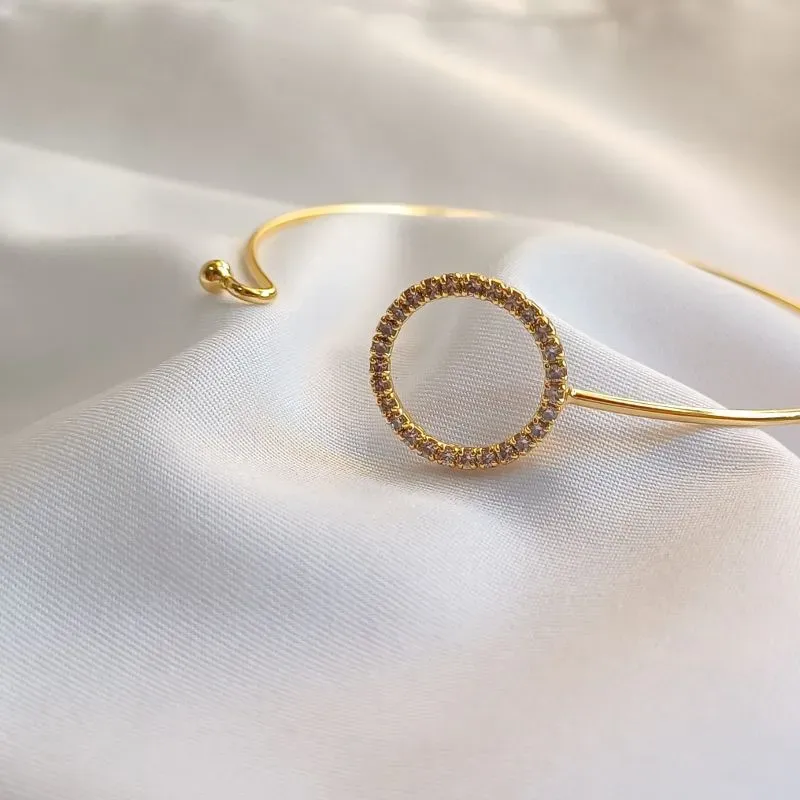 BRAC CIRCULO CRAV 18K