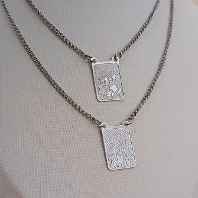 ESC AÇO NOSSA SRA INOX