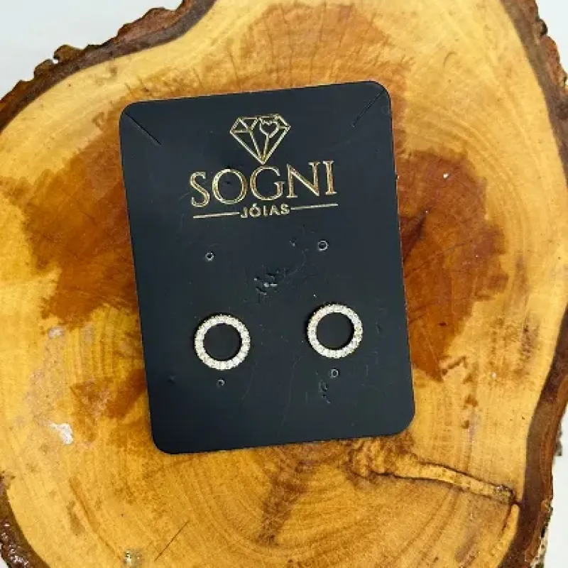 BRINCO CIRCULO VAZADO CRAVEJADO